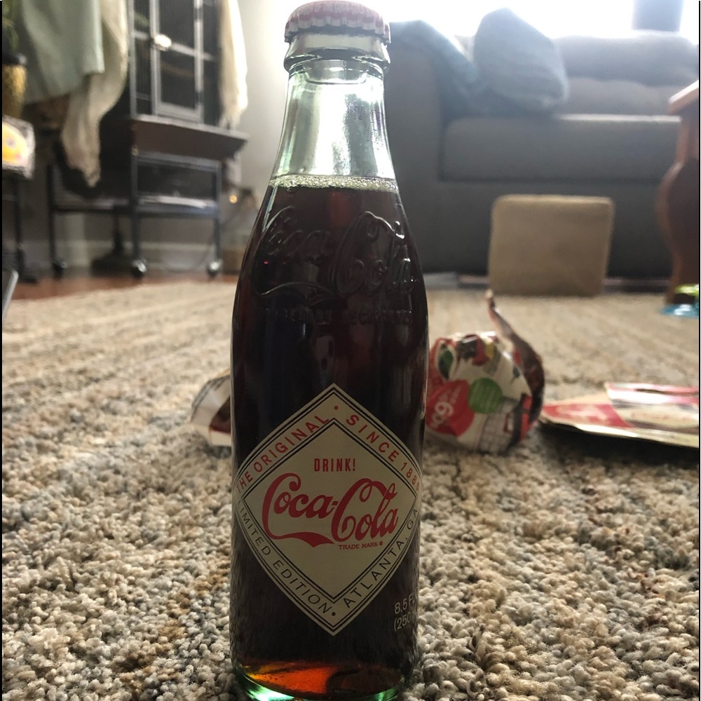 4 limited edition coca cola bottles unopened